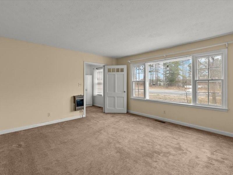 4624 Macland Road Hiram, GA 30141 - Photo 4 of 12 an empty room with windows