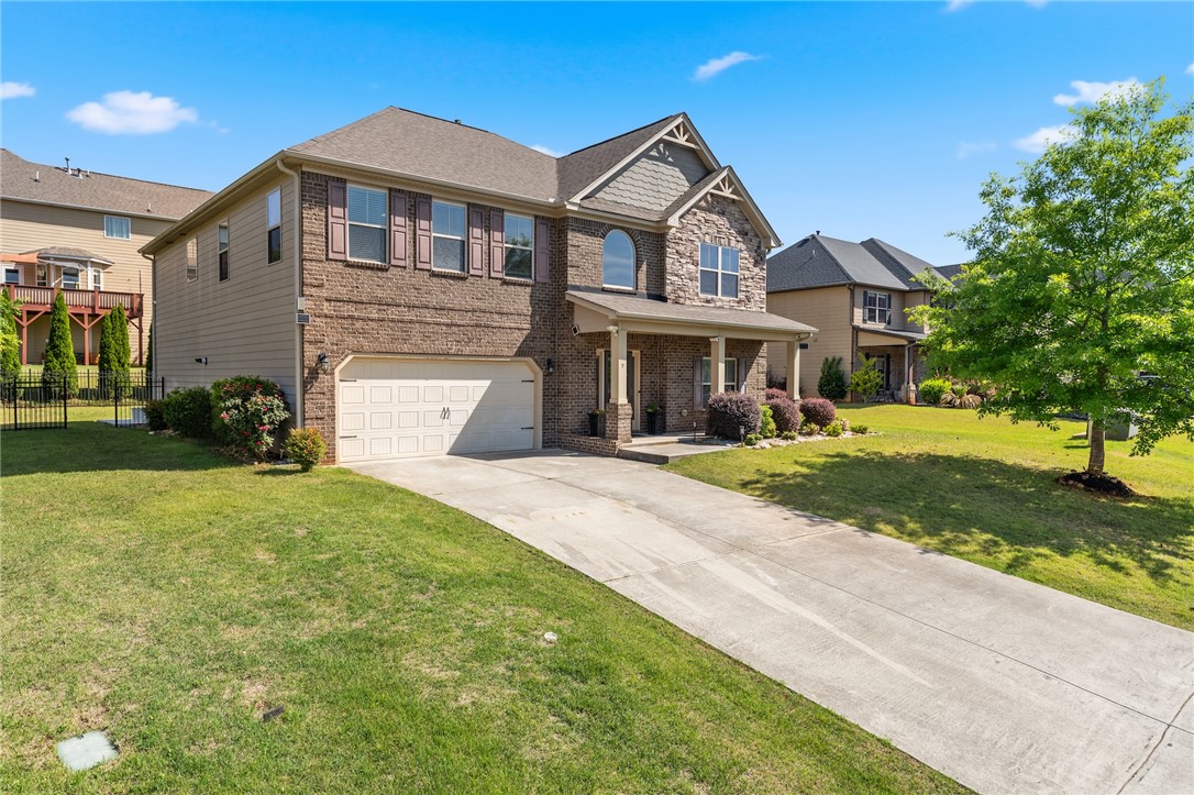 5 Tolkien Drive Anderson, SC 29621 - Photo 2 of 36 A classic brick exterior and long driveway frame this two-story traditional home.