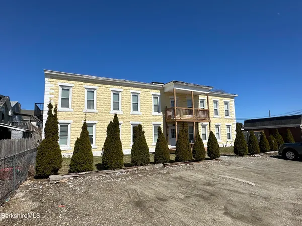 a view of a house with many windows