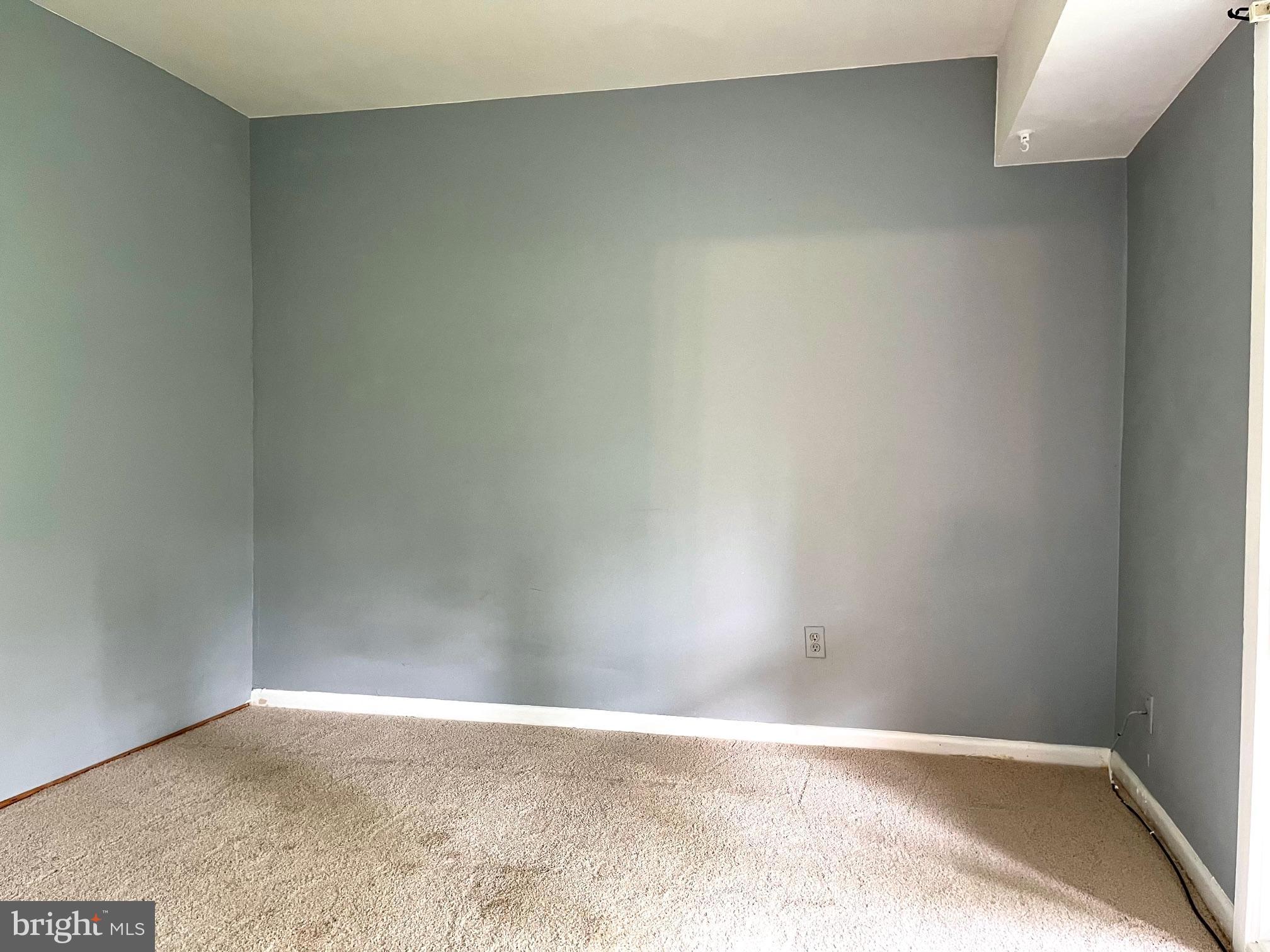 3138 Brinkley Road, Unit 8303 Temple Hills, MD 20748 - Photo 18 of 18 a view of an empty room