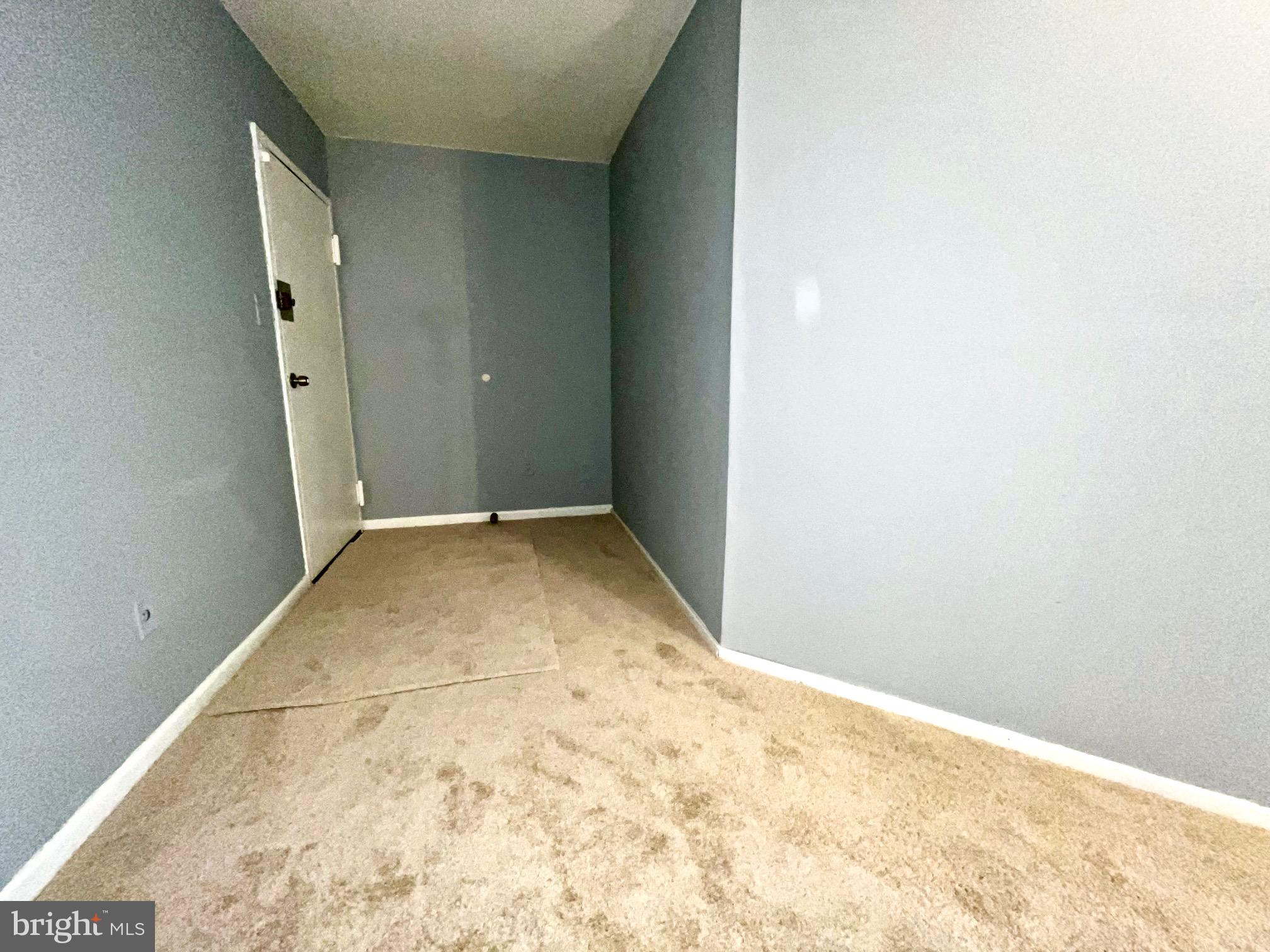 3138 Brinkley Road, Unit 8303 Temple Hills, MD 20748 - Photo 4 of 18 an empty room with a gallery