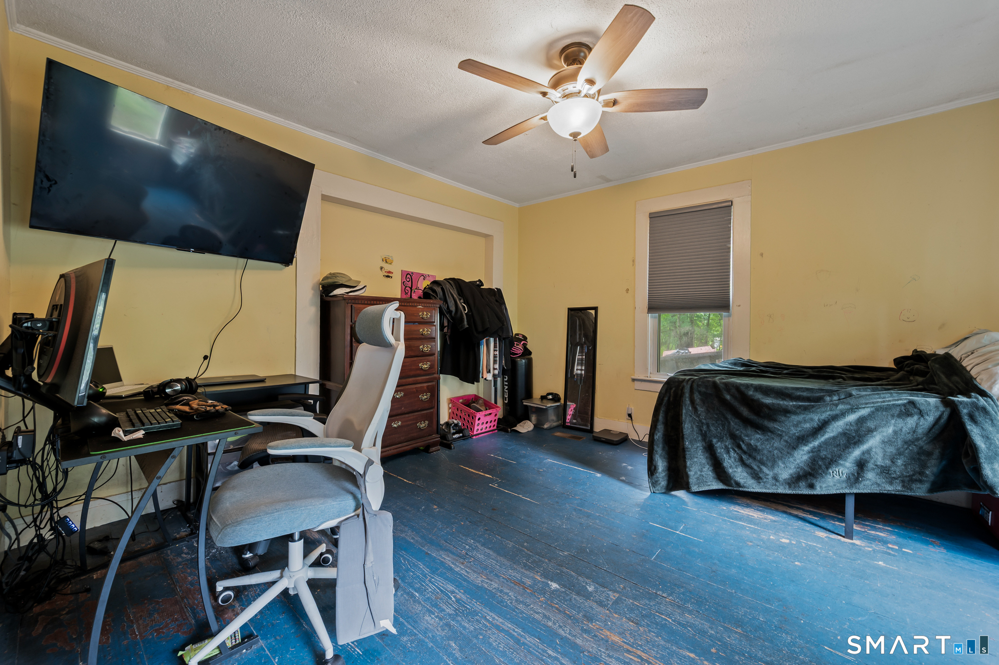 220 Murray Street Meriden, CT 06450 - Photo 11 of 28 a bedroom with furniture and a flat screen tv