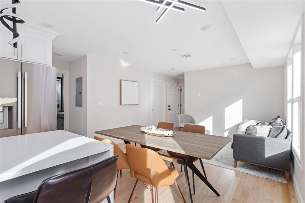 155 A Boston Avenue, Unit 2 Somerville, MA 02144 - Photo 5 of 38 a view of a dining room with furniture