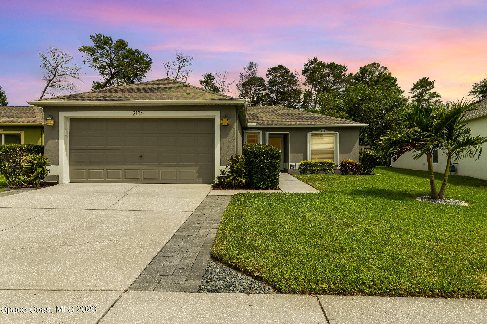 2136 Spring Creek Circle Palm Bay, FL 32905 - Photo 1 of 24 Front View