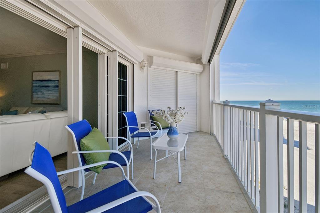 1586 Gulf Boulevard, Unit 2502 Clearwater Beach, FL 33767 - Photo 35 of 47 a outdoor space with furniture