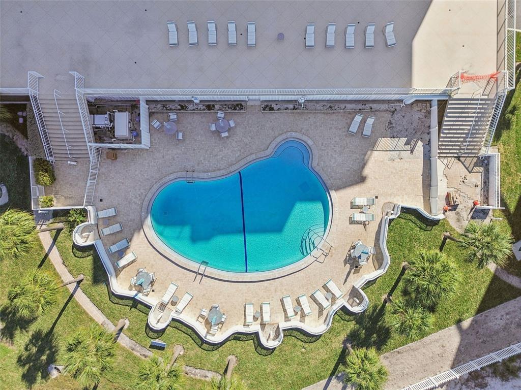 1586 Gulf Boulevard, Unit 2502 Clearwater Beach, FL 33767 - Photo 39 of 47 an aerial view of a house with a swimming pool