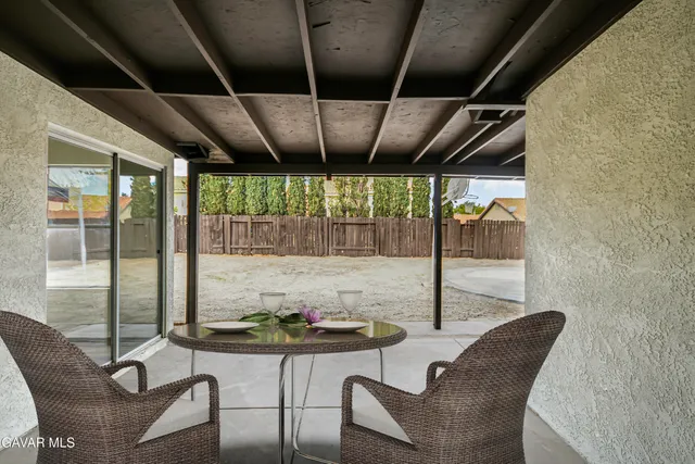 a room with furniture and window