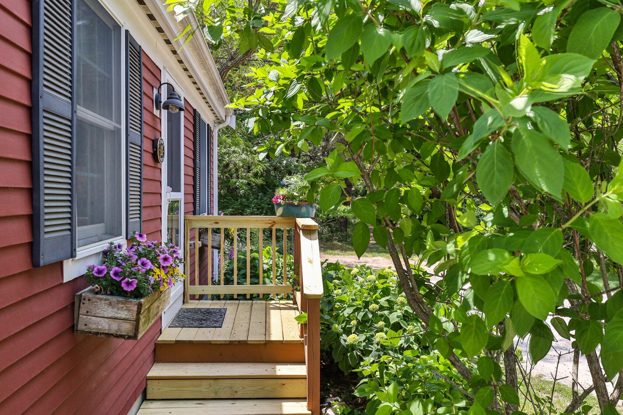 6 Shore Road, Unit 10 Truro, MA 02666 - Photo 2 of 37 a view of porch with seating space
