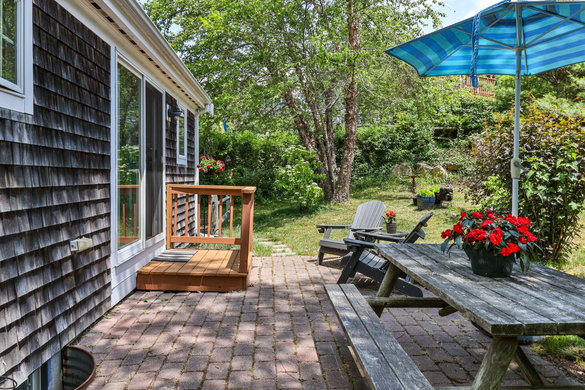 6 Shore Road, Unit 10 Truro, MA 02666 - Photo 27 of 37 a view of yard with patio