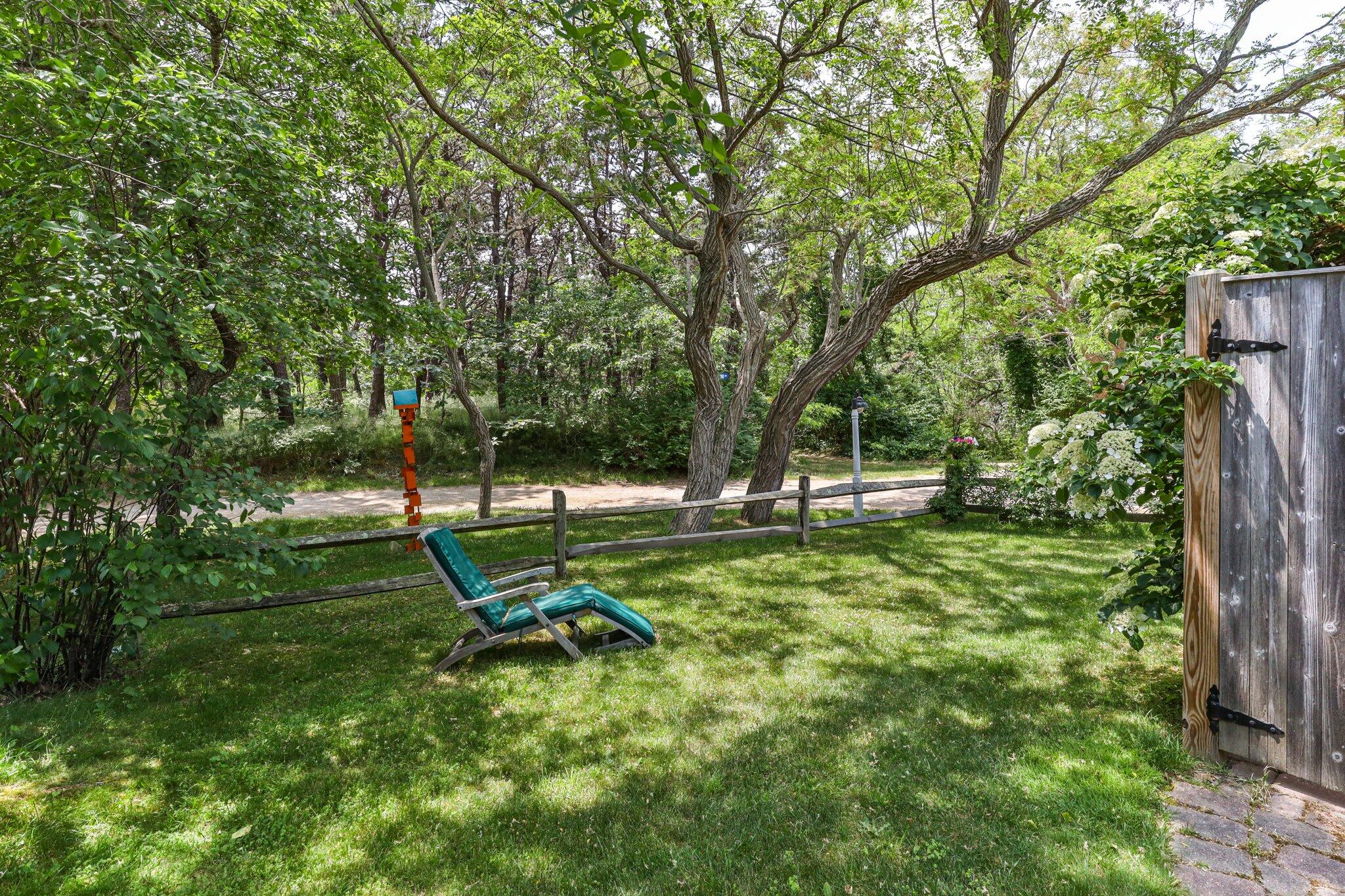 6 Shore Road, Unit 10 Truro, MA 02666 - Photo 30 of 37 a view of a park with large trees