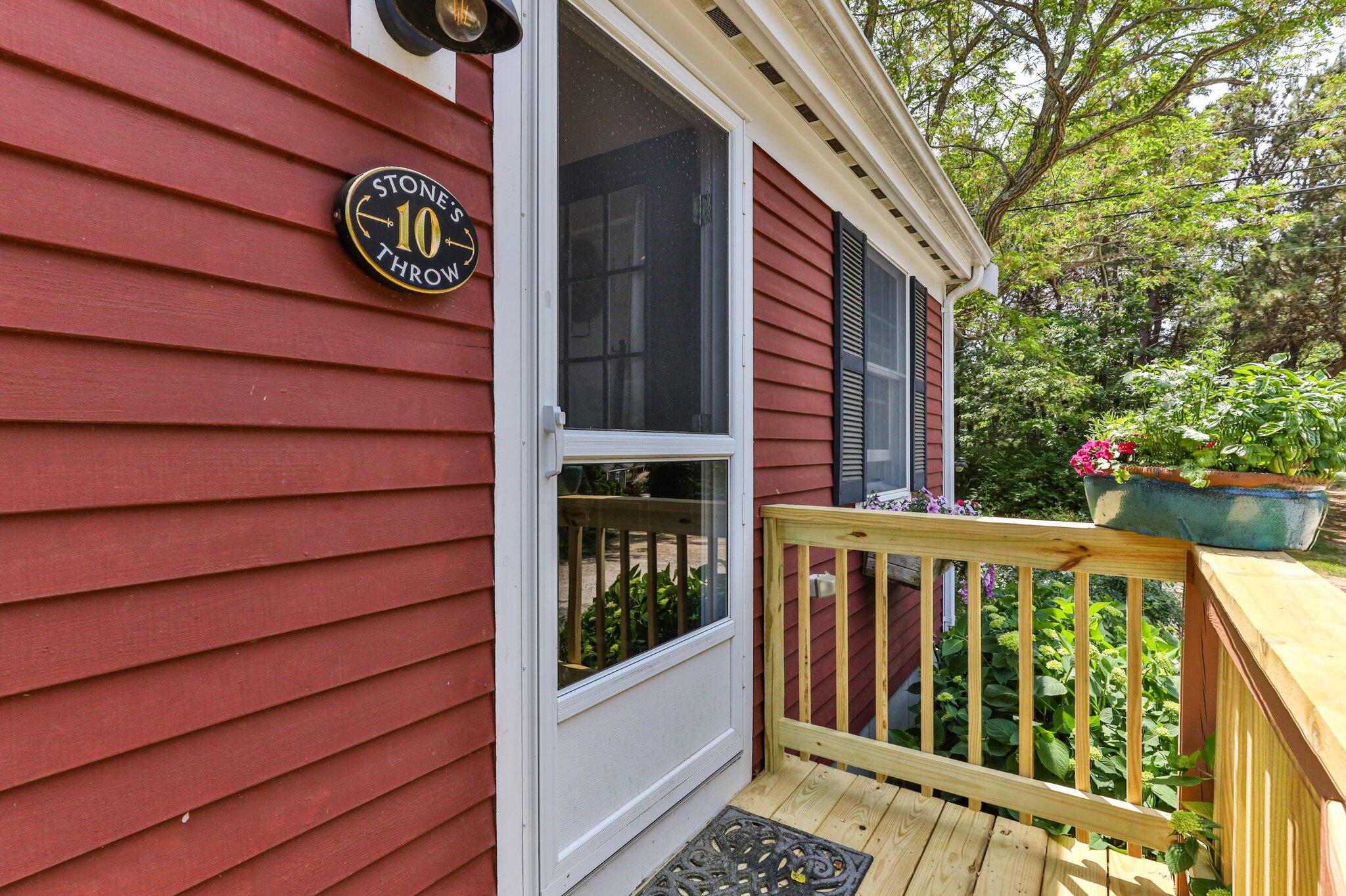 6 Shore Road, Unit 10 Truro, MA 02666 - Photo 3 of 37 a view of a street with stairs