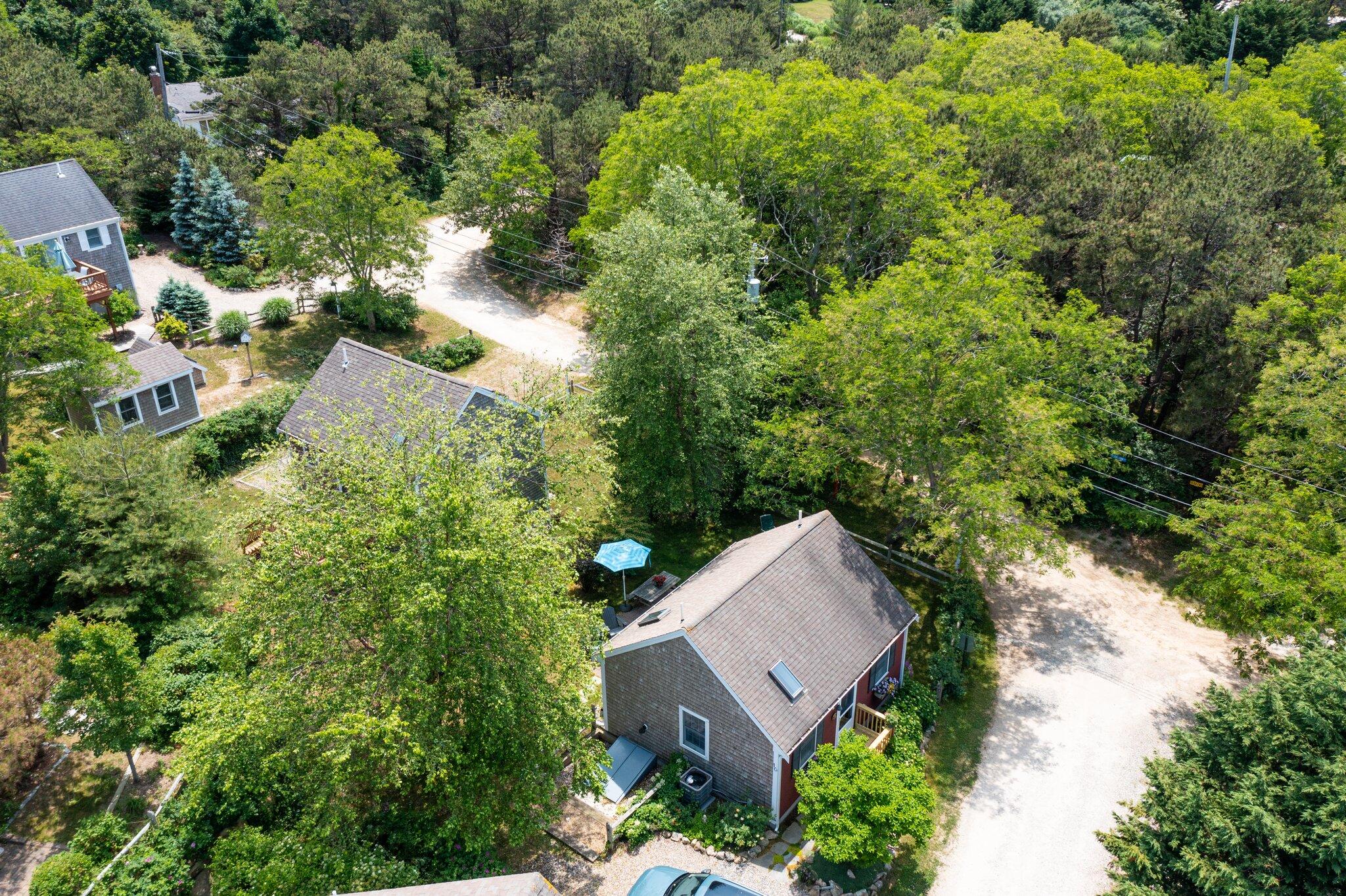 6 Shore Road, Unit 10 Truro, MA 02666 - Photo 36 of 37 an aerial view of a house with yard