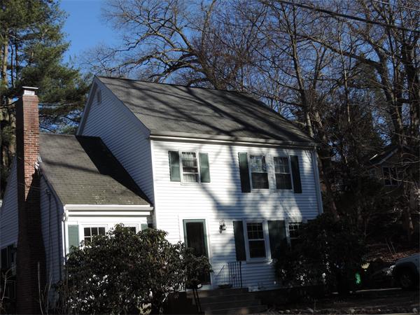 169 Islington Road Newton, MA 02466 - Photo 1 of 16 a front view of a house with plants and trees