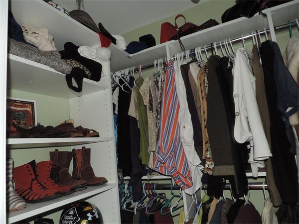 169 Islington Road Newton, MA 02466 - Photo 11 of 16 a view of walk in closet with clothes and shoes