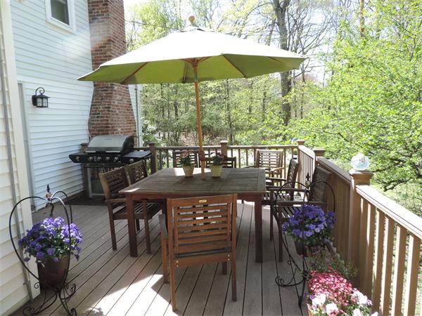 169 Islington Road Newton, MA 02466 - Photo 2 of 16 a view of a deck with furniture