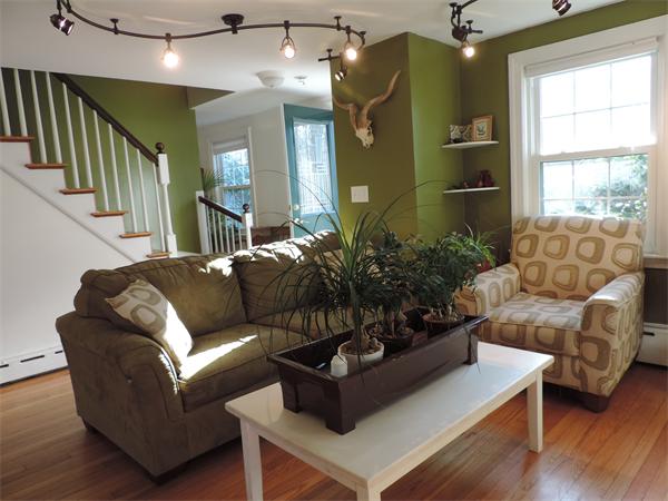 169 Islington Road Newton, MA 02466 - Photo 3 of 16 a living room with furniture and a large window