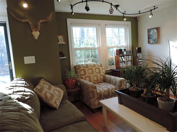 169 Islington Road Newton, MA 02466 - Photo 4 of 16 a living room with furniture and a large window