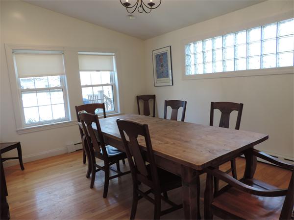 169 Islington Road Newton, MA 02466 - Photo 8 of 16 a view of a dining room with furniture and window