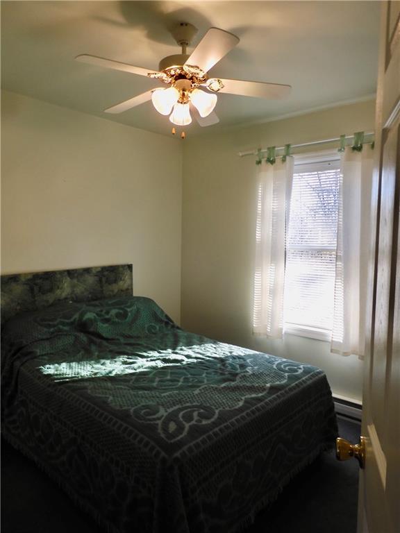 407 Oneida Trail Mercer, PA 16137 - Photo 14 of 25 a bed sitting in a bedroom next to a window