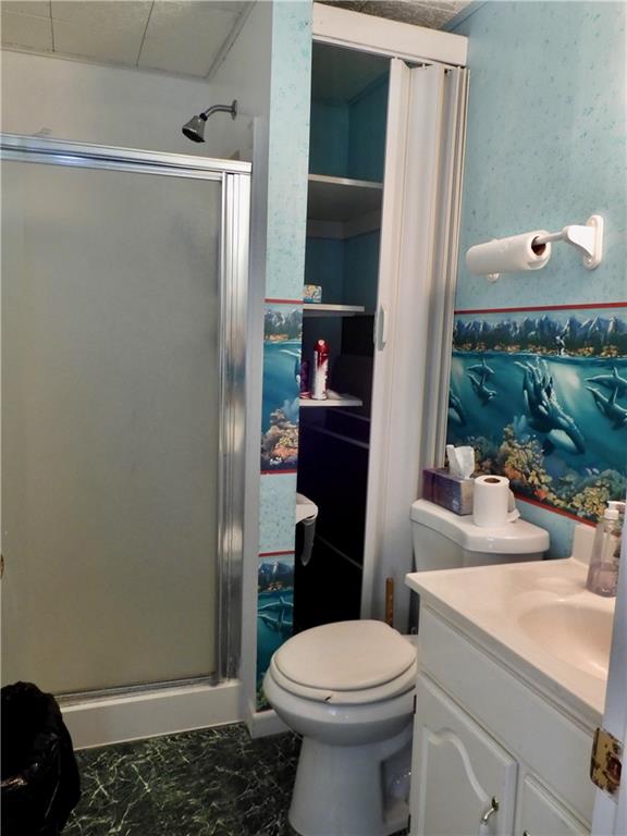 407 Oneida Trail Mercer, PA 16137 - Photo 18 of 25 a bathroom with a sink a toilet and shower
