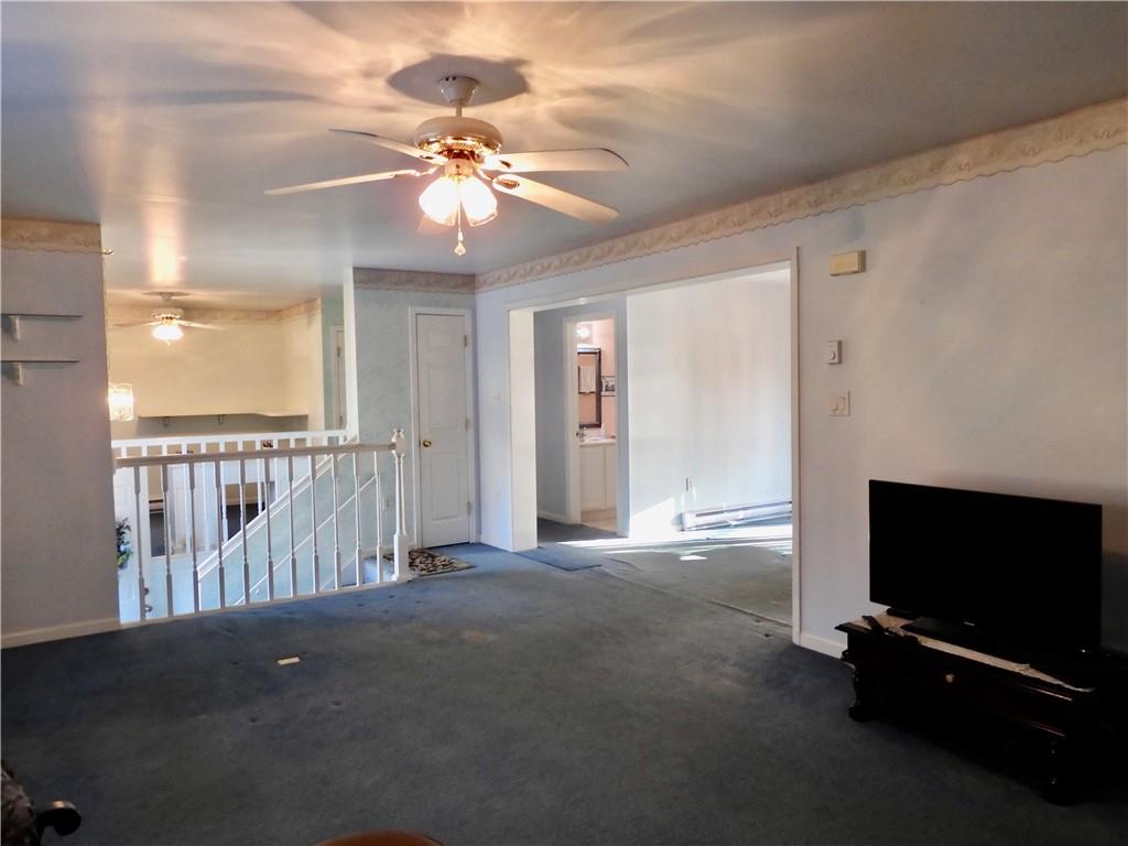 407 Oneida Trail Mercer, PA 16137 - Photo 3 of 25 a view of an empty room with a flat screen tv