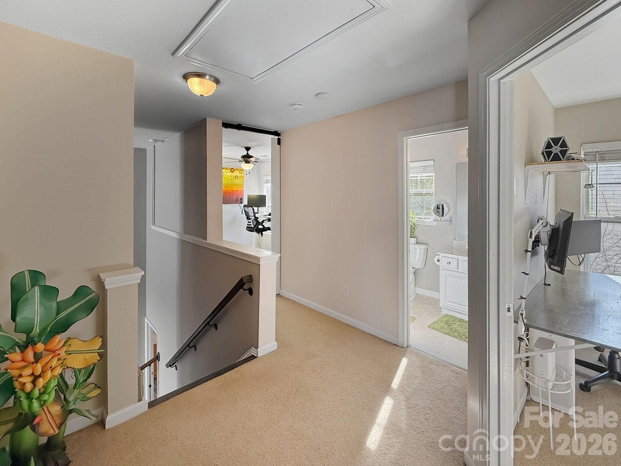 179 Whitley Mills Road, Unit 44 Fort Mill, SC 29708 - Photo 16 of 25 a view of an entryway with wooden floor and a livingroom view