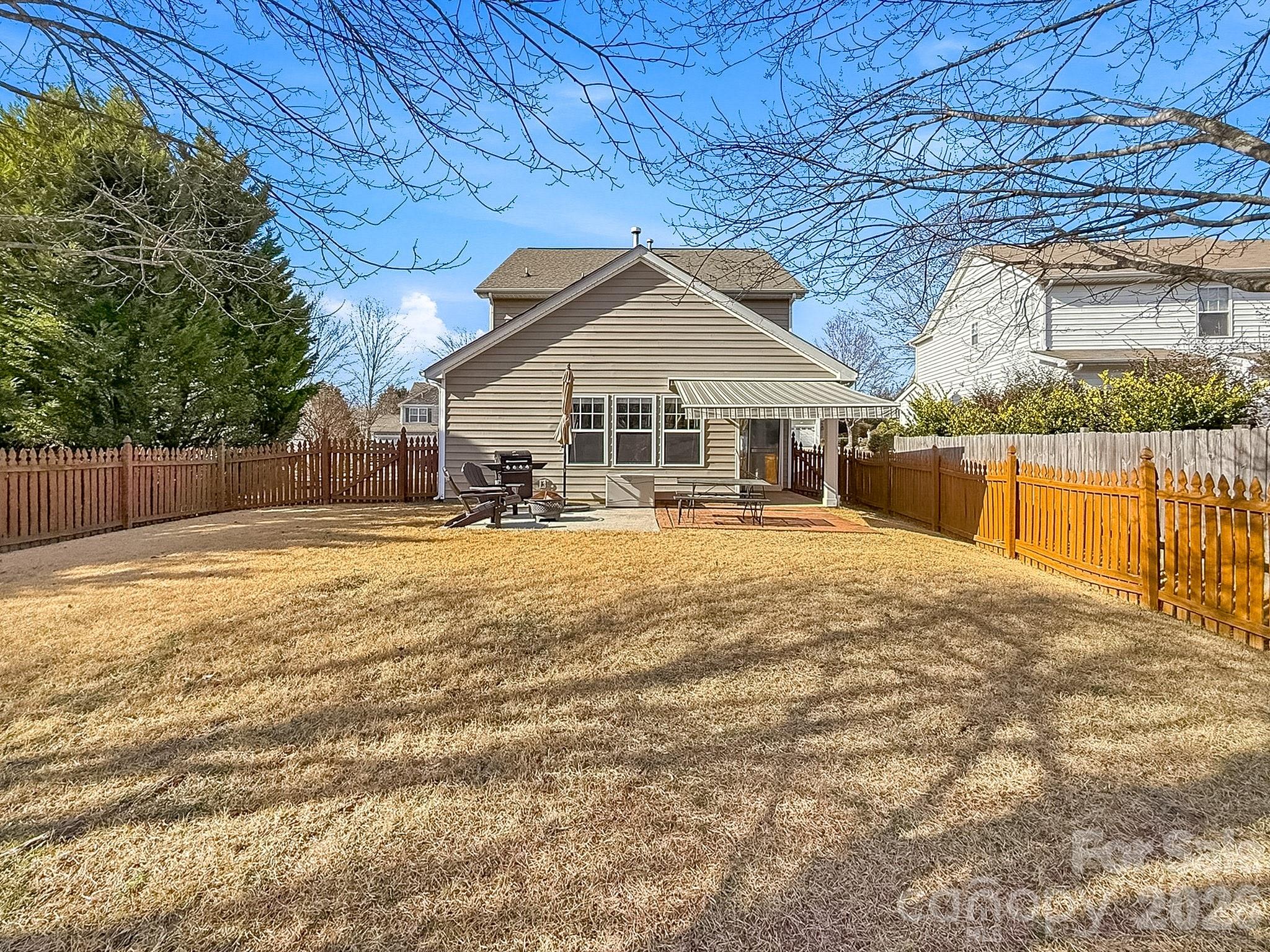 179 Whitley Mills Road, Unit 44 Fort Mill, SC 29708 - Photo 22 of 25 a view of a house with a yard
