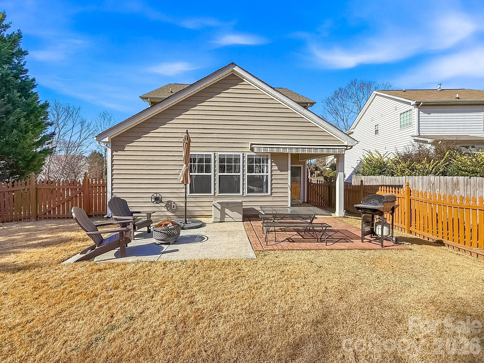 179 Whitley Mills Road, Unit 44 Fort Mill, SC 29708 - Photo 23 of 25 a front view of a house with a patio