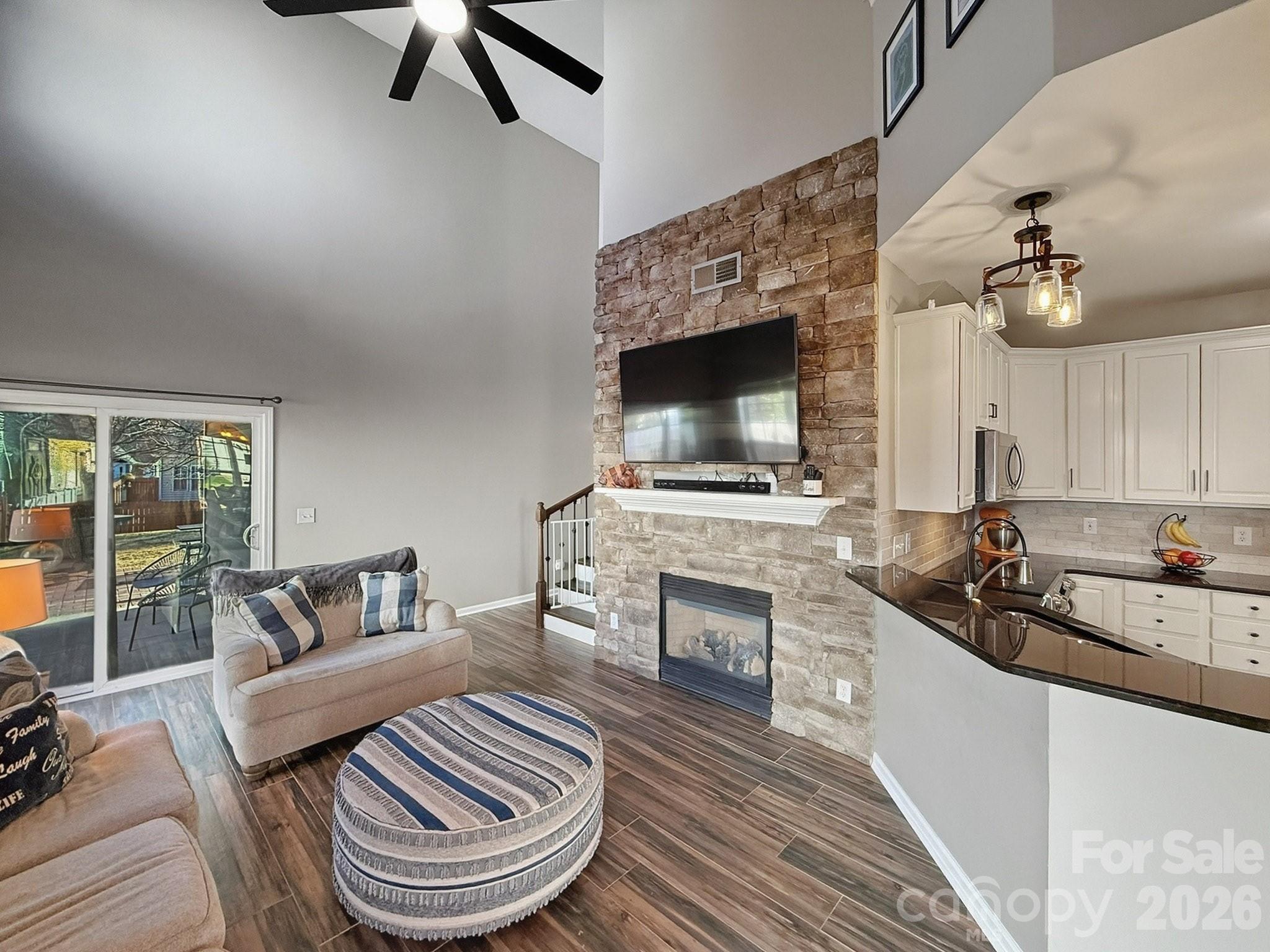 179 Whitley Mills Road, Unit 44 Fort Mill, SC 29708 - Photo 5 of 25 a living room with furniture and a fireplace
