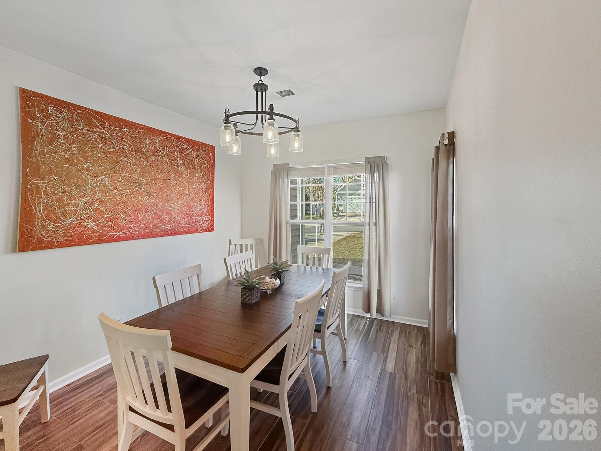 179 Whitley Mills Road, Unit 44 Fort Mill, SC 29708 - Photo 7 of 25 a view of a dining room with furniture window and wooden floor