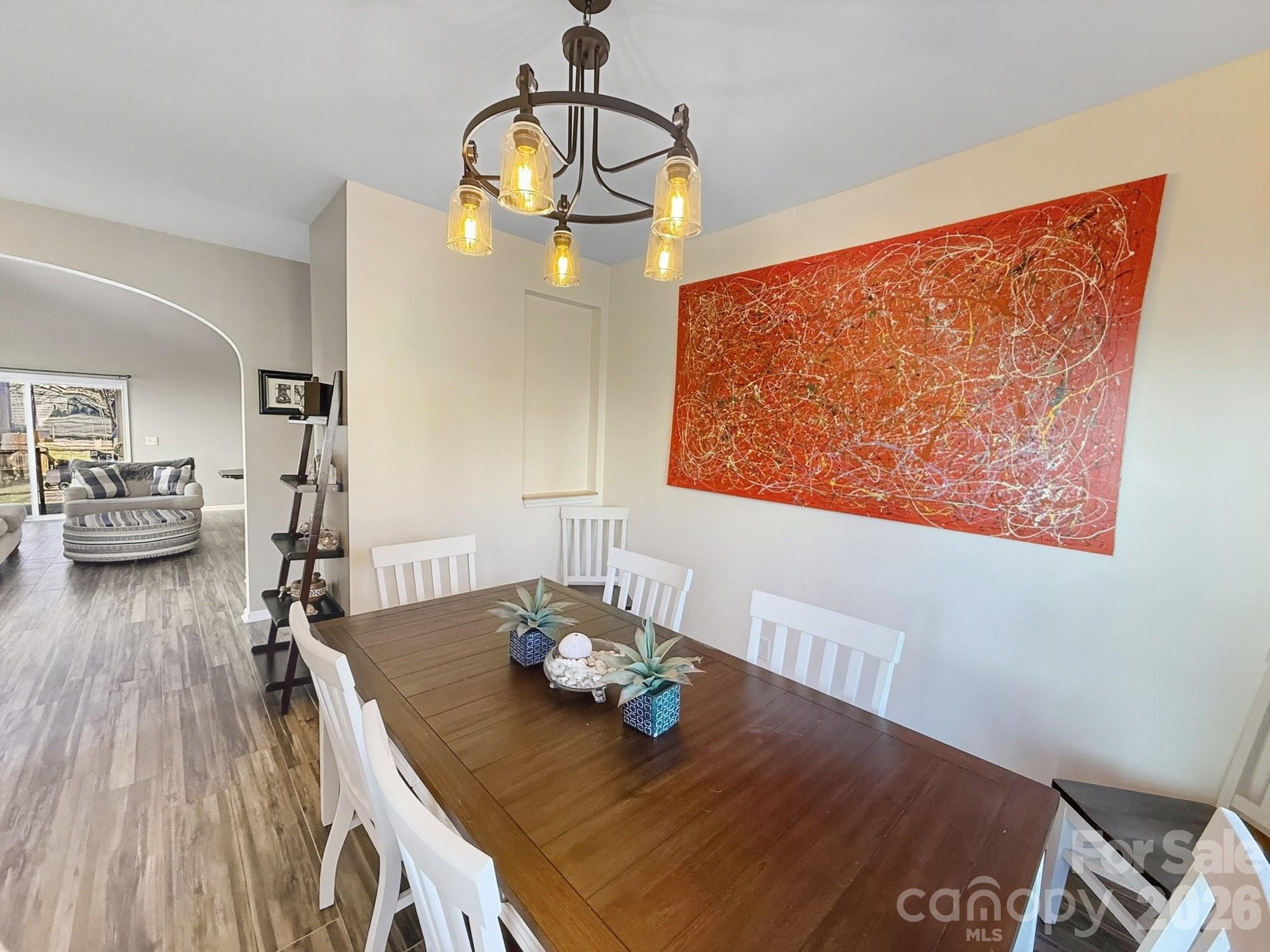 179 Whitley Mills Road, Unit 44 Fort Mill, SC 29708 - Photo 8 of 25 a view of a dining room with furniture and wooden floor