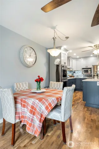 a view of a dining room with furniture