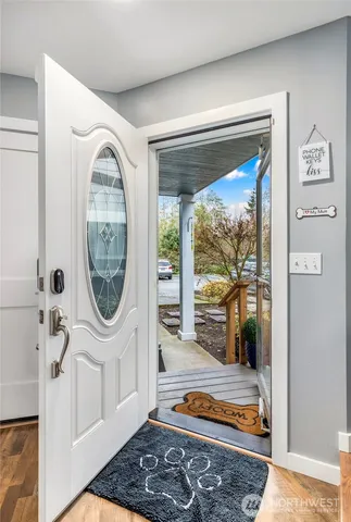 a room with furniture and a large window