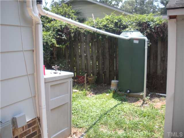 5822 Newhall Road Durham, NC 27713 - Photo 23 of 25 The Spacious Back Yard features space for a home garden and a 300 Gallon Rain Barrel Collector. Back Yard