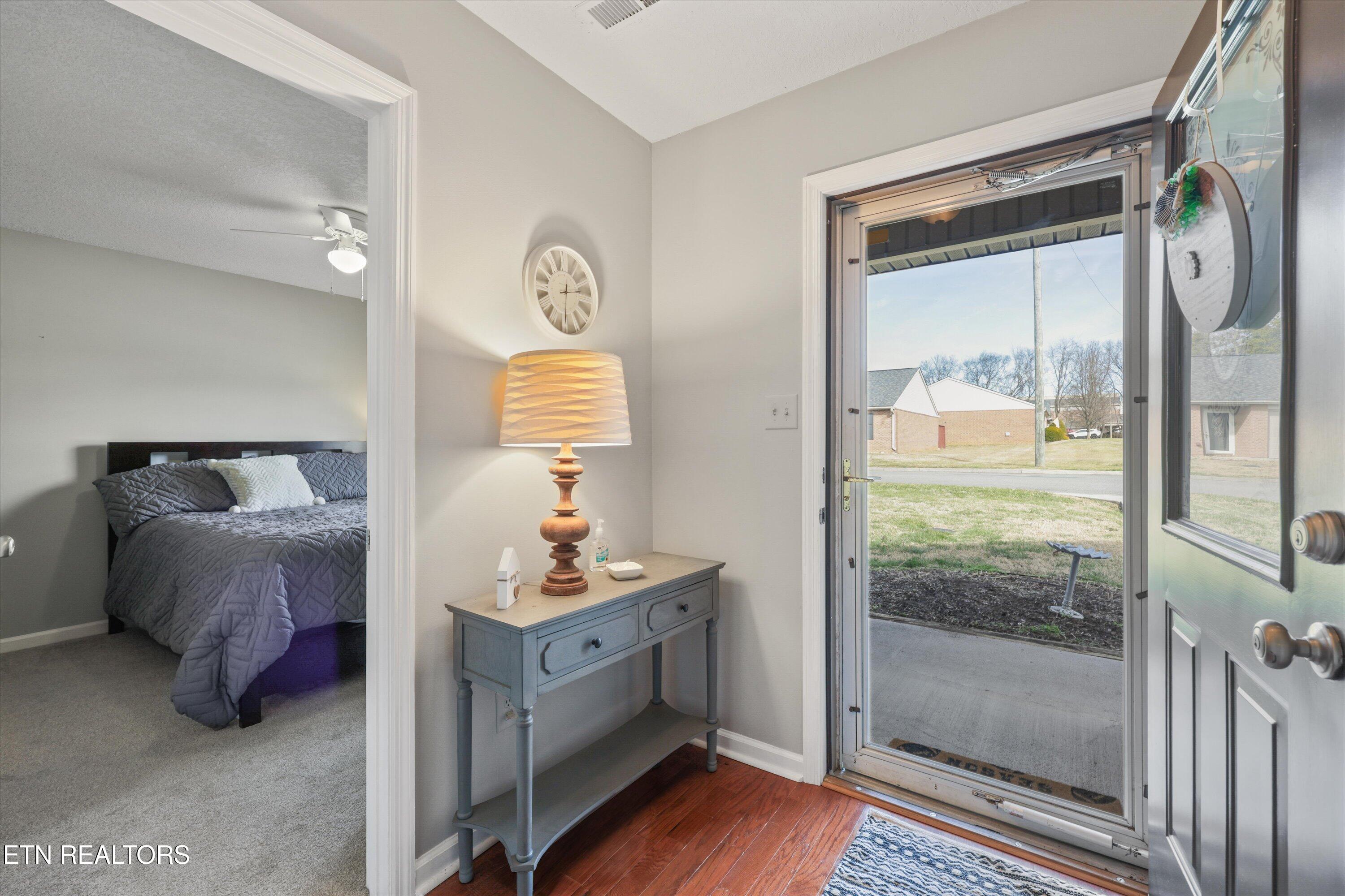 7213 Lyngate Boulevard Powell, TN 37849 - Photo 3 of 39 Storm door and front bedroom