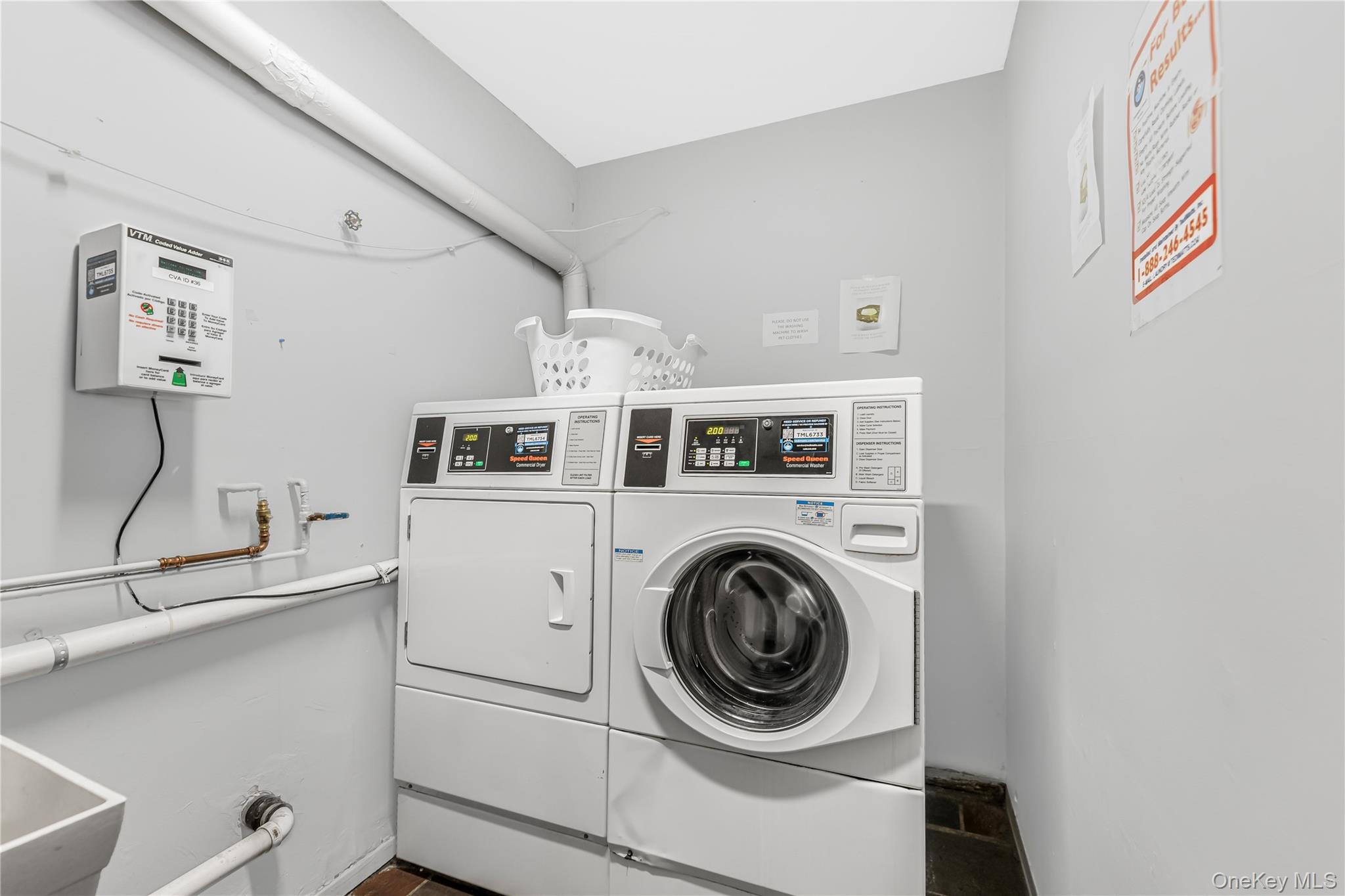 914 Old Country Road Elmsford, NY 10523 - Photo 17 of 21 a utility room with dryer and washer