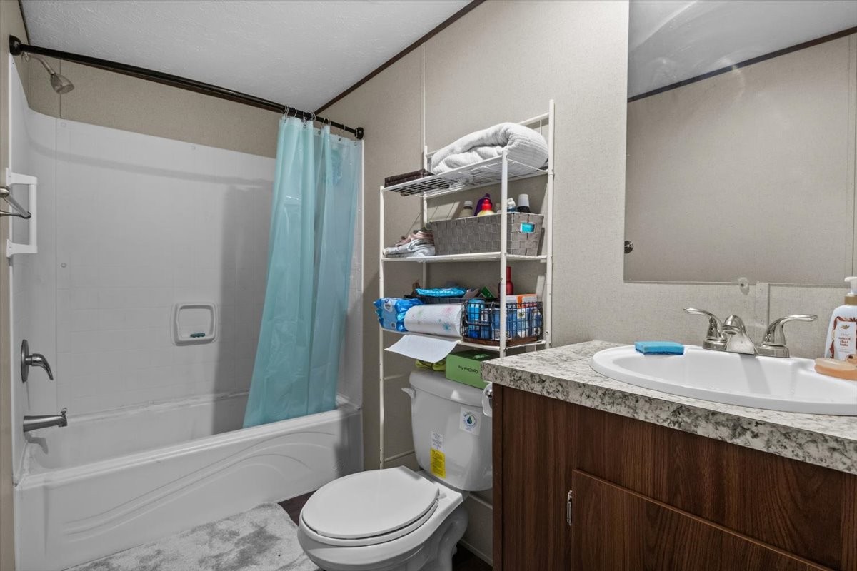 316 Friendship Drive Tennessee Ridge, TN 37178 - Photo 18 of 28 a bathroom with a granite countertop sink toilet and shower