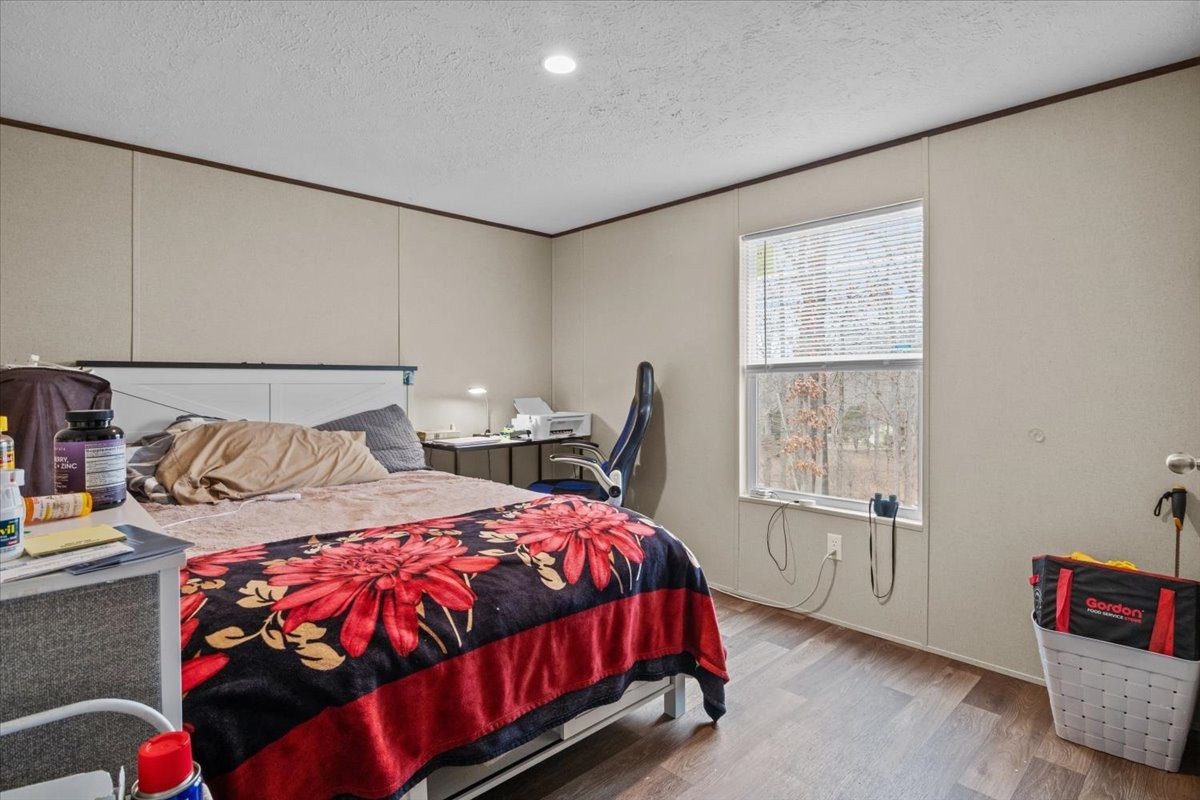 316 Friendship Drive Tennessee Ridge, TN 37178 - Photo 21 of 28 a bedroom with a bed and a window