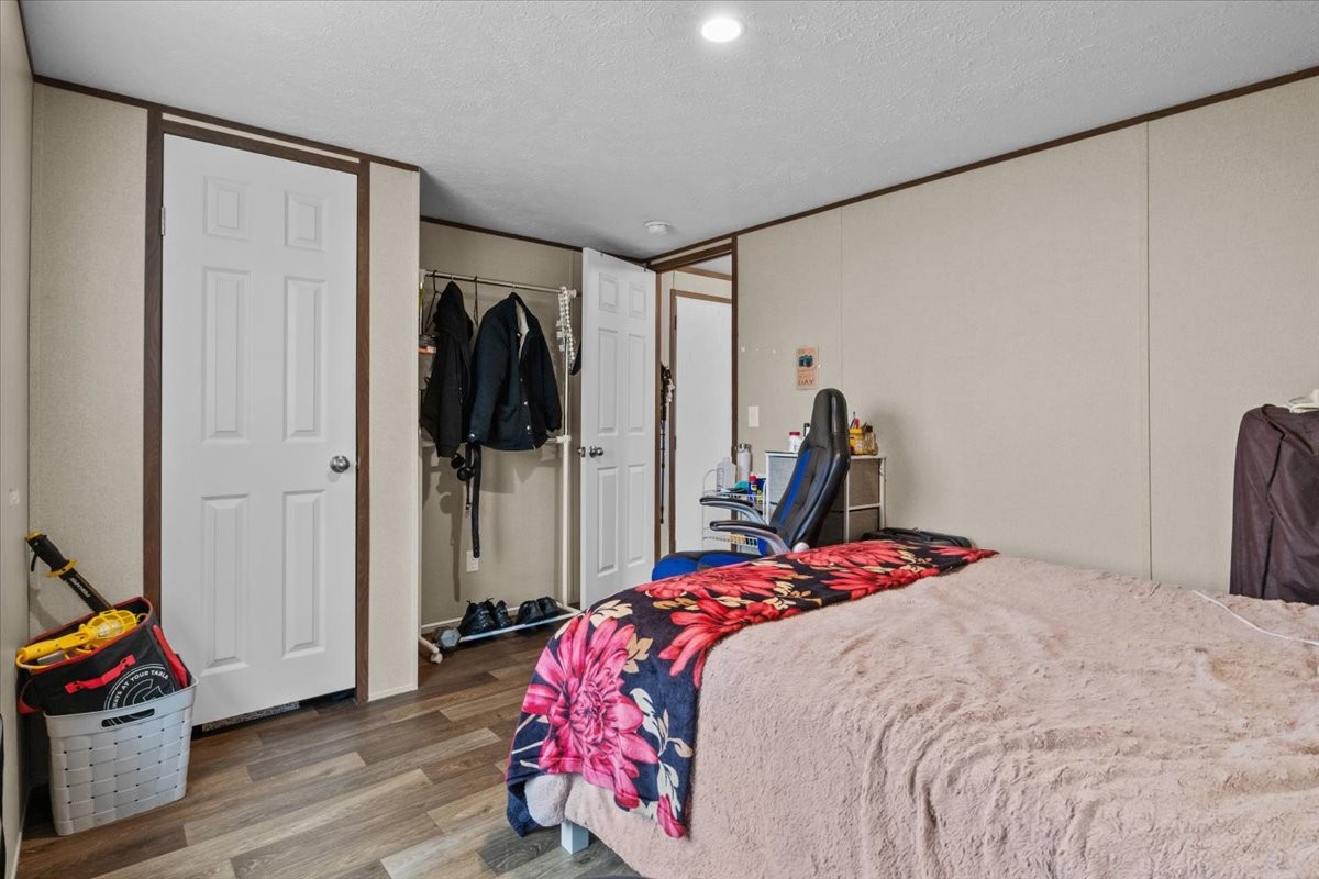 316 Friendship Drive Tennessee Ridge, TN 37178 - Photo 22 of 28 a bedroom with a bed and a closet