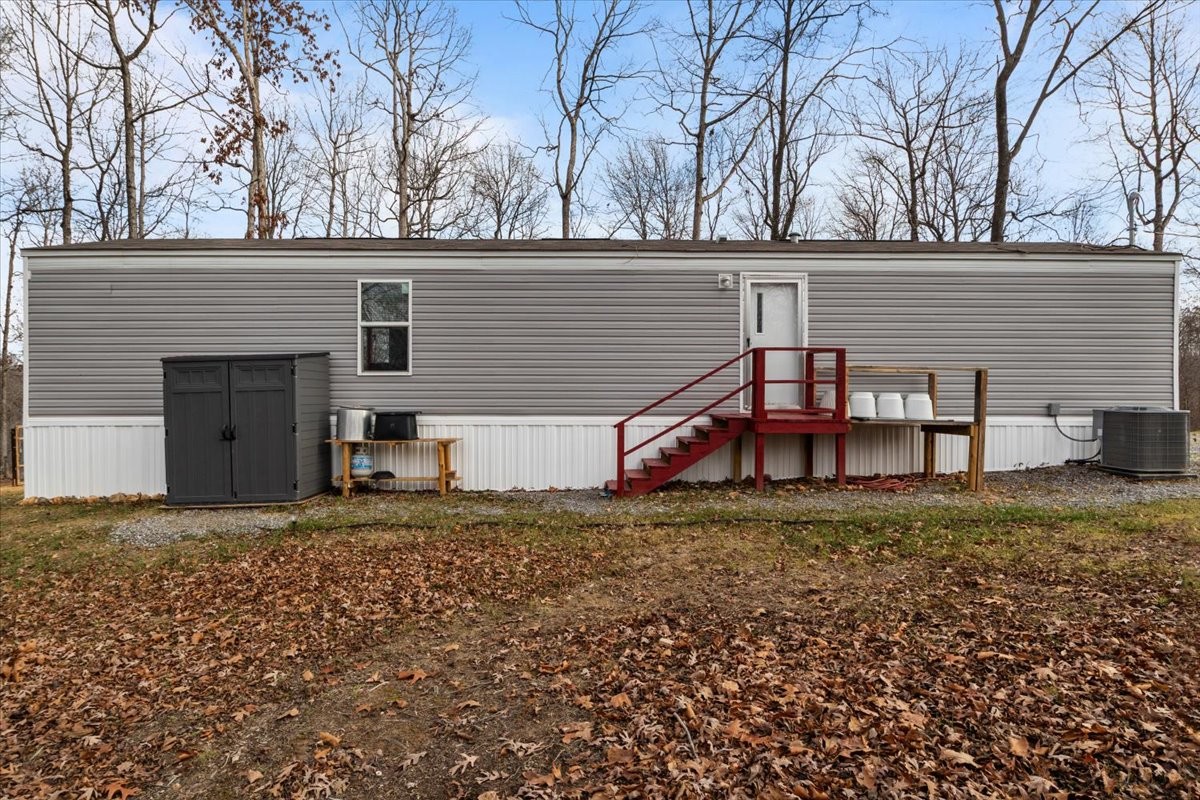 316 Friendship Drive Tennessee Ridge, TN 37178 - Photo 26 of 28 a view of a house with a yard