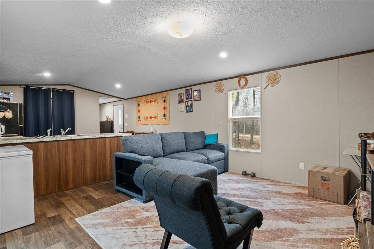 316 Friendship Drive Tennessee Ridge, TN 37178 - Photo 7 of 28 a living room with furniture and a window