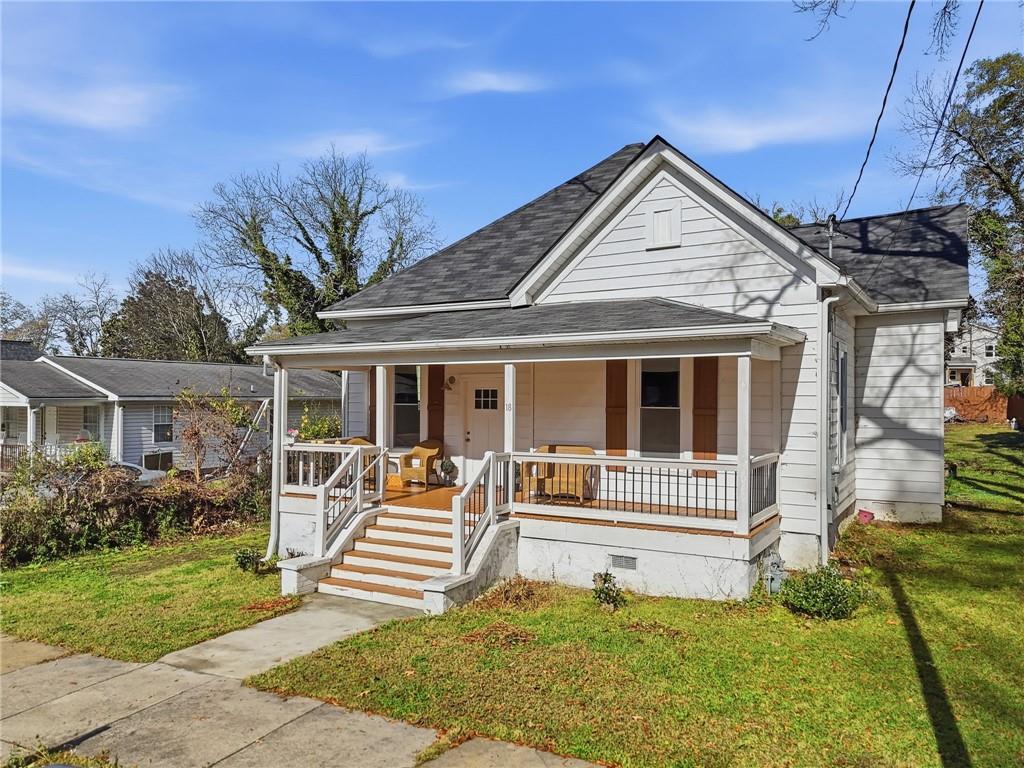 18 Butler Street Rome, GA 30161 - Photo 22 of 26 front view of a house with a yard