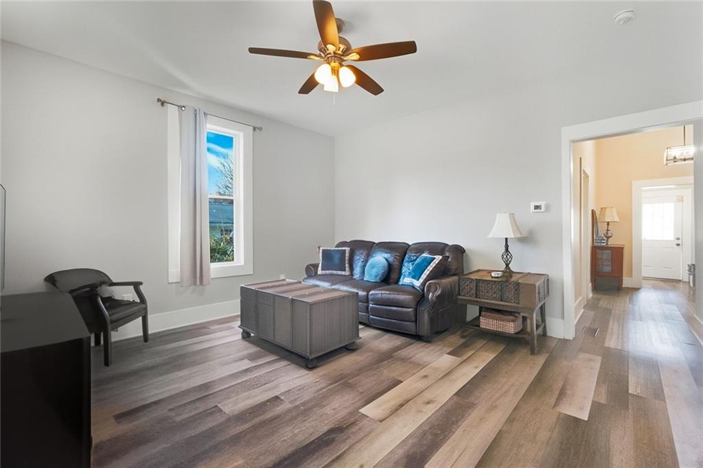 18 Butler Street Rome, GA 30161 - Photo 6 of 26 a living room with furniture and a window