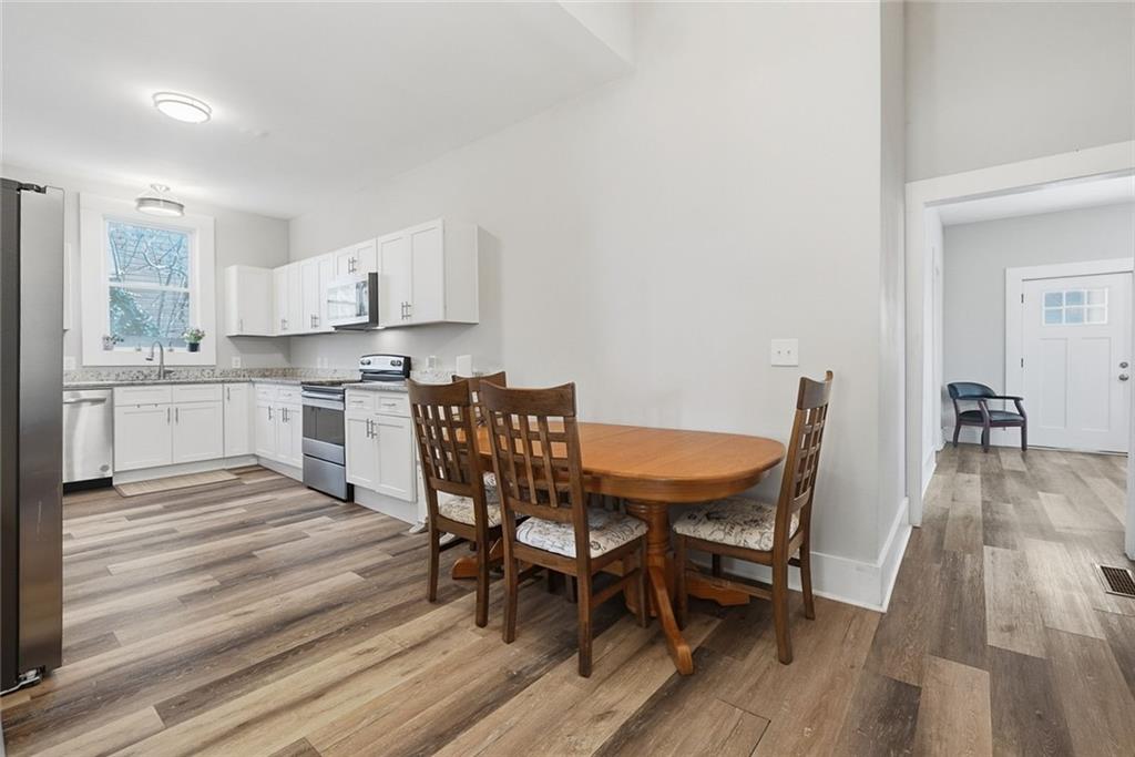 18 Butler Street Rome, GA 30161 - Photo 9 of 26 a view of a dining room with furniture and wooden floor