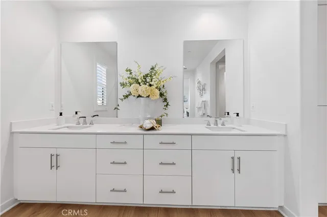 an aerial view of a residential apartment building with a yard