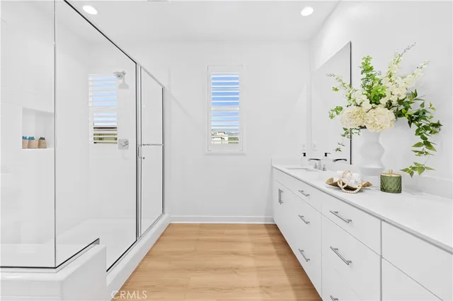 an aerial view of residential building and ocean view