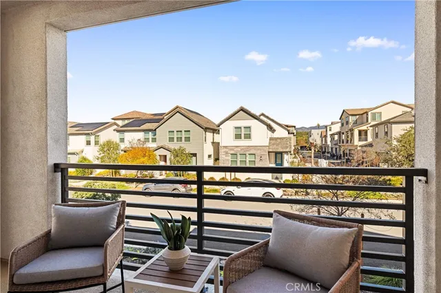a view of outdoor space with seating area and trees
