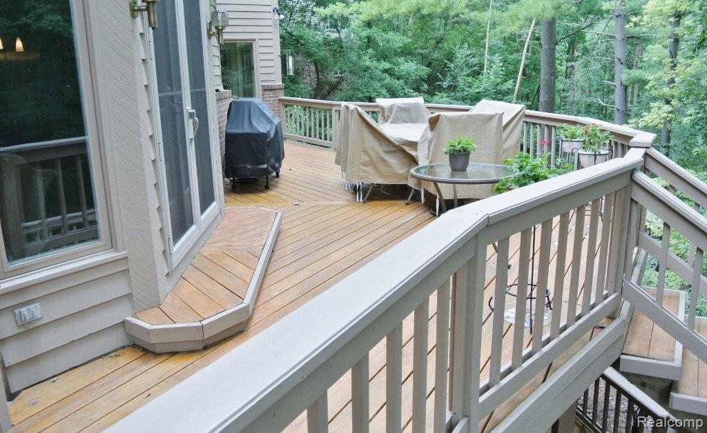 1450 Ridge Court Rochester, MI 48306 - Photo 21 of 22 TIERED DECK OVERLOOKS WOODED LOT
