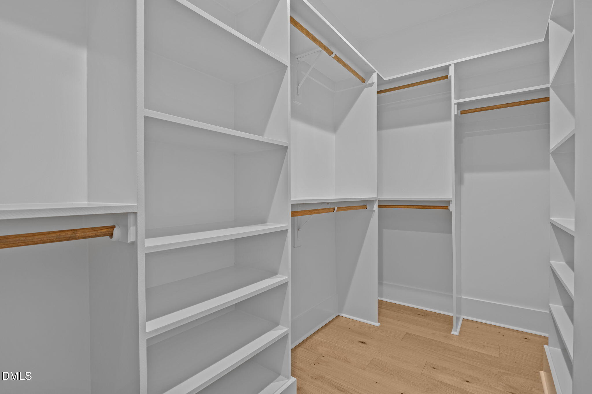 10 Carnation Road Youngsville, NC 27596 - Photo 18 of 47 a view of an empty walk in closet