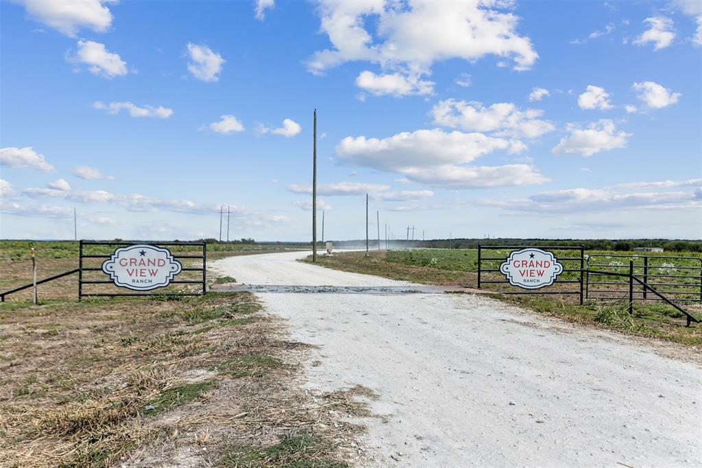 450 Private Road 453 Road, Unit LOT 12 Grandview, TX 76050 - Photo 5 of 15 View of road with a rural view